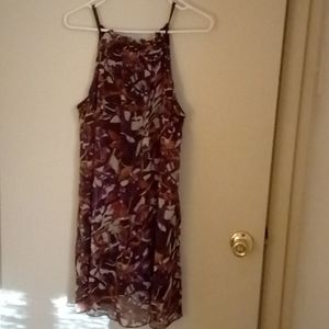 Colorful floral sundress with flower embellishment